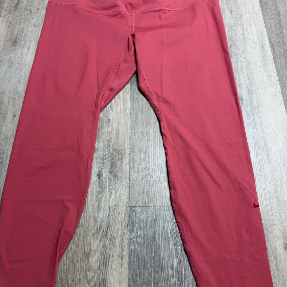 Nike women’s Coral-Red Performance Leggings